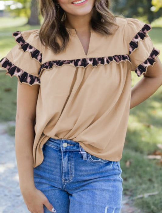MOTION OF MERCY LEOPARD BLOUSE